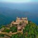Kumbhalgarh Fort Rajasthan panoramic view with ancient walls and hilltop structures.